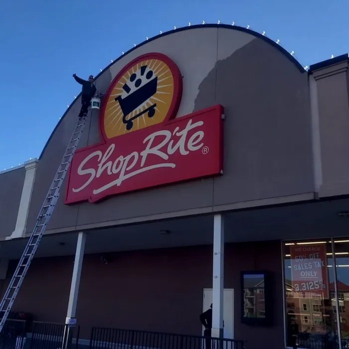ShopRite: Storefront repainted above an open store.