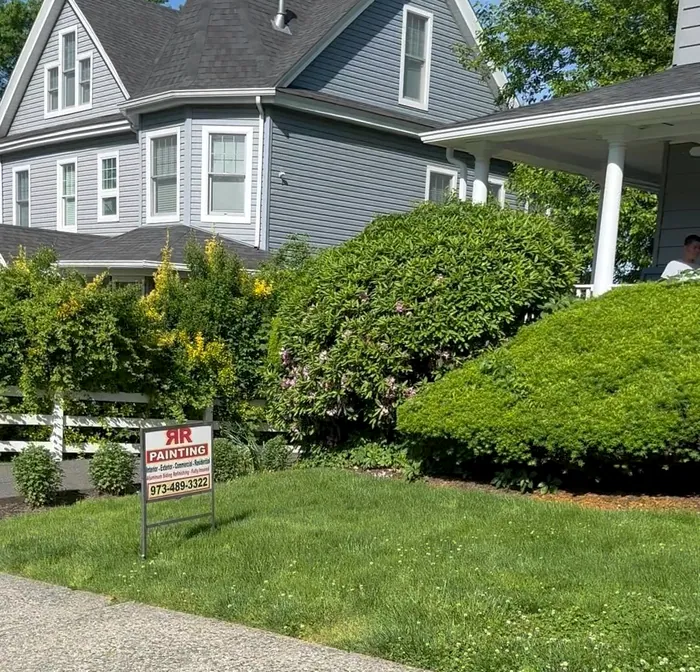 Aluminum siding: Power-washed and repainted.